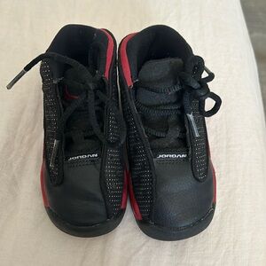size 7c black and red jordans